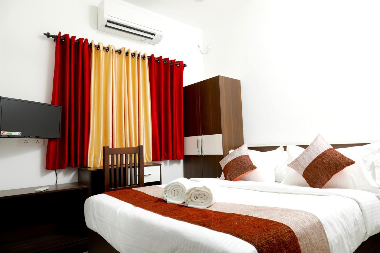 Puthens Clifton Inn Kottajam Kültér fotó