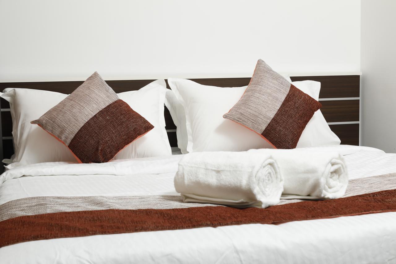 Puthens Clifton Inn Kottajam Kültér fotó